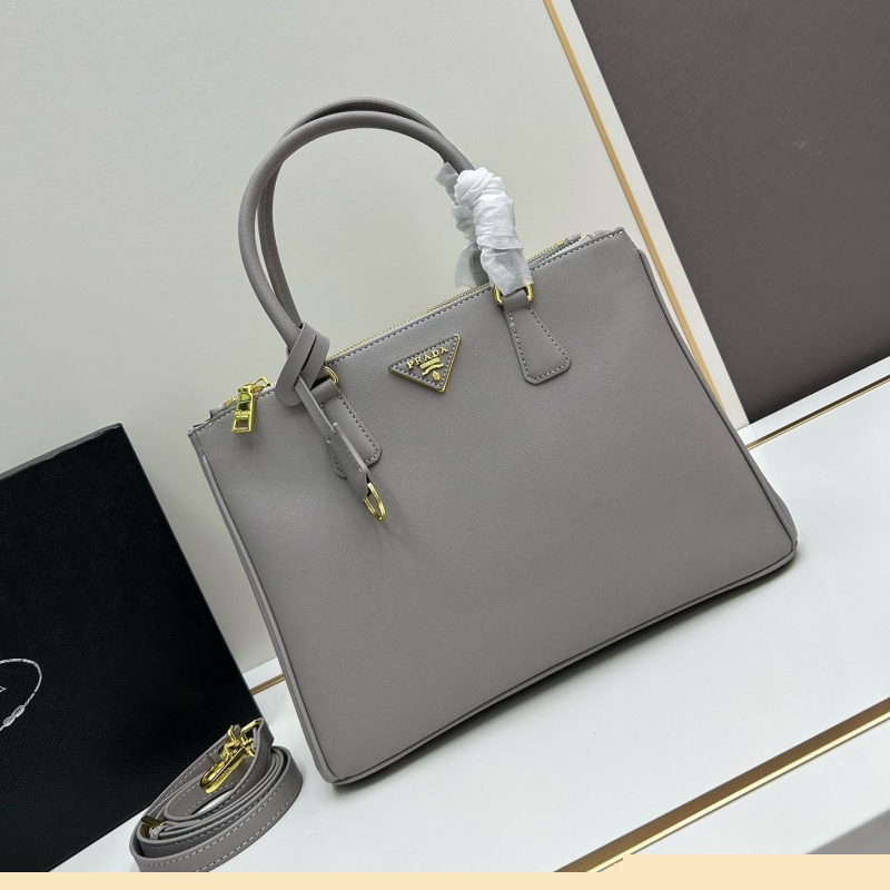 Pra*a top handle bags